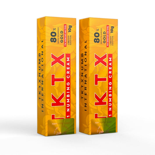 TKTX Numbing Cream Gold in two vibrant yellow-orange 10g boxes with red and black text, labeled 80% Gold formula